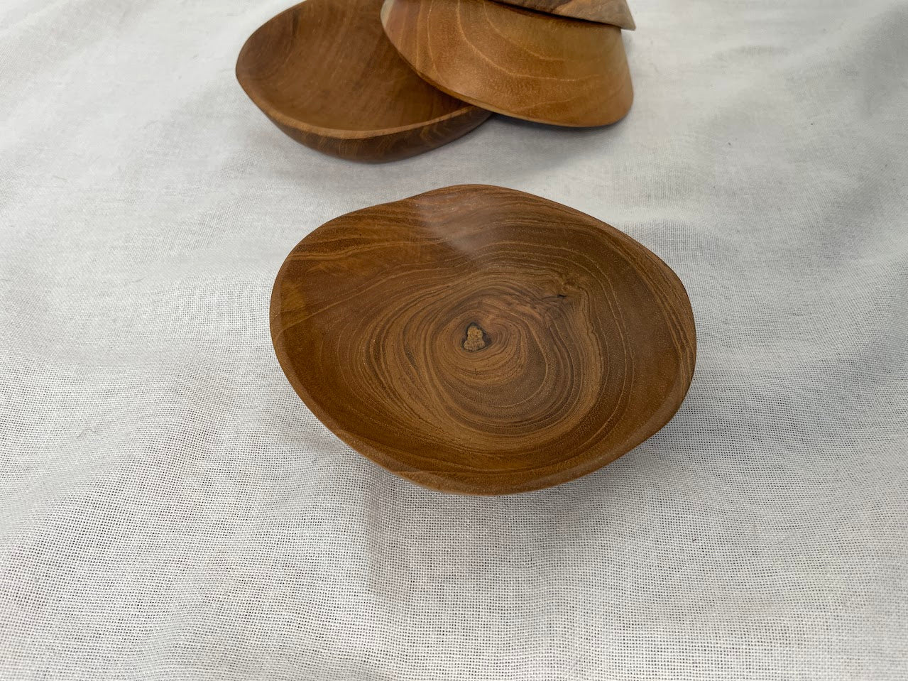 Close up details of hand carved teak root bowl