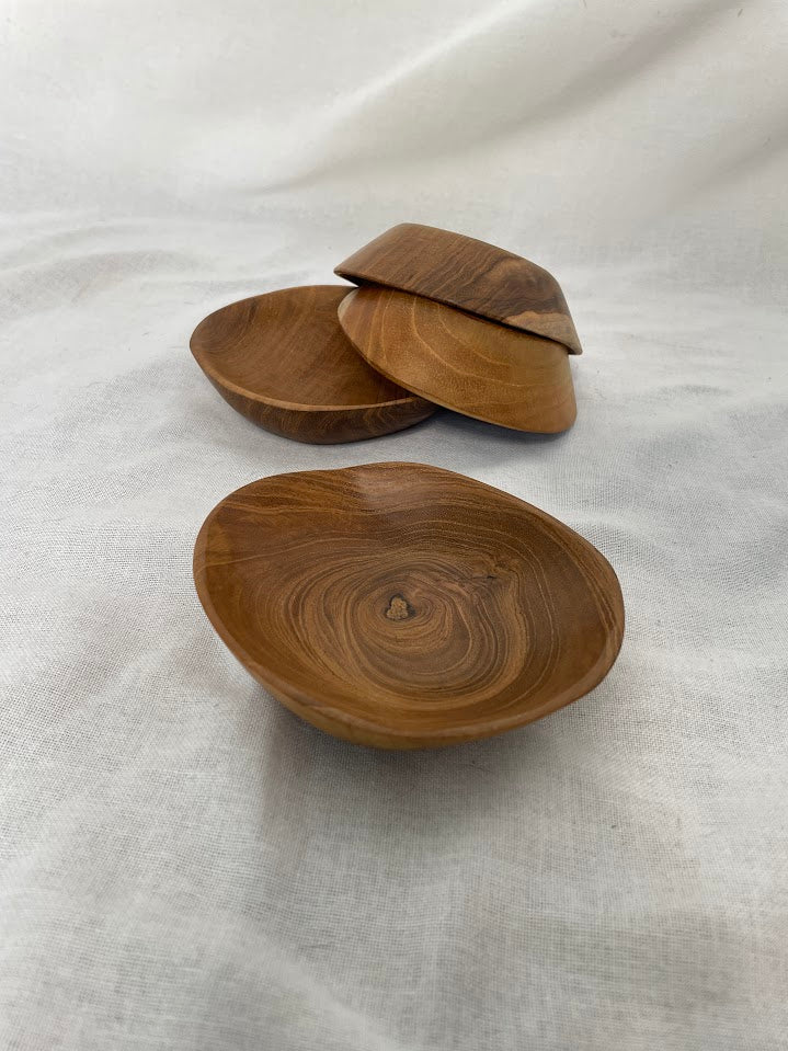 Collection of hand carved teak root wooden serving bowls