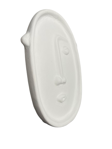 Side view of a face plate decor piece