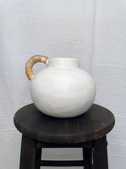 Short round white pottery vase pot with single rattan wrapped handle