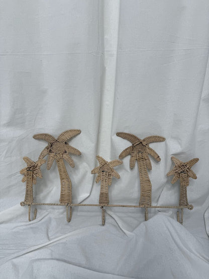 The back of a row of rattan palm tree hooks